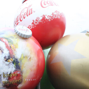 Coca-Cola themed giant Christmas ornaments in Olympic Park. Canon EOS Rebel T3i. Coca-Cola themed giant Christmas ornaments in Olympic Park. Canon EOS Rebel T3i.