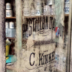 Vintage leaded pharmaceutical cabinet mirror reflects cans of paint at an antiques market in Woodstock, GA, near Atlanta. Canon EOS Rebel T3i. Vintage leaded pharmaceutical cabinet mirror reflects cans of paint at an antiques market in Woodstock, GA, near Atlanta. Canon EOS Rebel T3i.Vintage leaded pharmaceutical cabinet mirror reflects cans of paint at an antiques market in Woodstock, GA, near Atlanta. Canon EOS Rebel T3i.