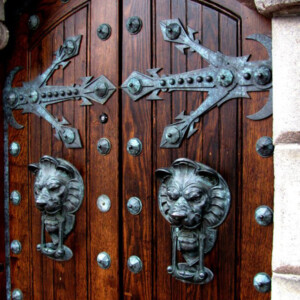 Decorative (and a little aggressive) doors heading into an apartment complex terrace area. Canon EOS Rebel T3i. Decorative (and a little aggressive) doors heading into an apartment complex terrace area. Canon EOS Rebel T3i.