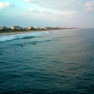 Surfers from Atlantic Beach pier on Emerald Isle, NC. Canon PowerShot SX150 IS. Surfers from Atlantic Beach pier on Emerald Isle, NC. Canon PowerShot SX150 IS.