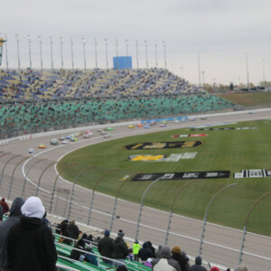 A lifelong race fan, my dad had yet to see a legit NASCAR race. As a Christmas present to my dad after his heart attack and sort of an incentive to relearn to walk after his amputation, I got him tickets to a NASCAR race. We may have only made it 70 laps on a ridiculously cold, windy, and drizzly fall day in KS, but I unexpectedly had a good time. Canon EOS Rebel T3i. A lifelong race fan, my dad had yet to see a legit NASCAR race. As a Christmas present to my dad after his heart attack and sort of an incentive to relearn to walk after his amputation, I got him tickets to a NASCAR race. We may have only made it 70 laps on a ridiculously cold, windy, and drizzly fall day in KS, but I unexpectedly had a good time. Canon EOS Rebel T3i.