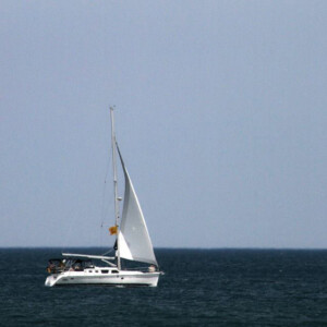 Sailboat on Lake Michigan from Washington Park and Michigan City Beach in Michigan City, IN. Canon EOS T3i. Sailboat on Lake Michigan from Washington Park and Michigan City Beach in Michigan City, IN. Canon EOS T3i.Sailboat on Lake Michigan from Washington Park and Michigan City Beach in Michigan City, IN. Canon EOS T3i.