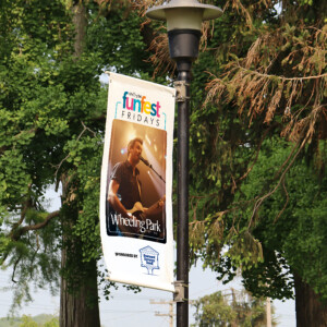 Light pole banners lining the road through Wheeling Park Light pole banners lining the road through Wheeling Park