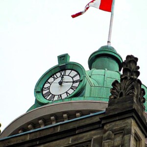 Clock and flag on St. Lawrence Hall in Toronto, ON. Clock and flag on St. Lawrence Hall in Toronto, ON.