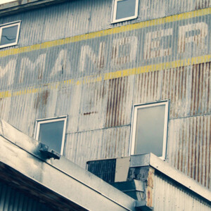 Close up of the weathered and rusting facade of the old Commander grain elevator. Originally built in 1898, it serves as yet another landmark in Stillwater's deep and rich history. Photography: Stillwater, MN. Close up of the weathered and rusting facade of the old Commander grain elevator. Originally built in 1898, it serves as yet another landmark in Stillwater's deep and rich history.