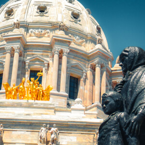 The immigrant mother and child part of the Knute Nelson Memorial Statue in front of the Minnesota State Capitol. Samsung Galaxy 10S. The immigrant mother and child part of the Knute Nelson Memorial Statue in front of the Minnesota State Capitol. Samsung Galaxy 10S.