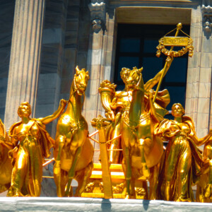 Golden horses and chariot at the top of the Minnesota State Capitol. Samsung Galaxy 10S. Golden horses and chariot at the top of the Minnesota State Capitol. Samsung Galaxy 10S.