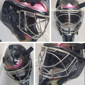 Layered gear design off-set with a torn texture and multi-color hypershift metallic on a Bauer NME VTX. Biomech
