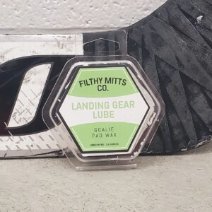 Updated packaging to hexagon clamshell with custom product label. Shape is purpose designed for ease of application on a variety of pads. Filthy Mitts Co. Landing Gear Lube
